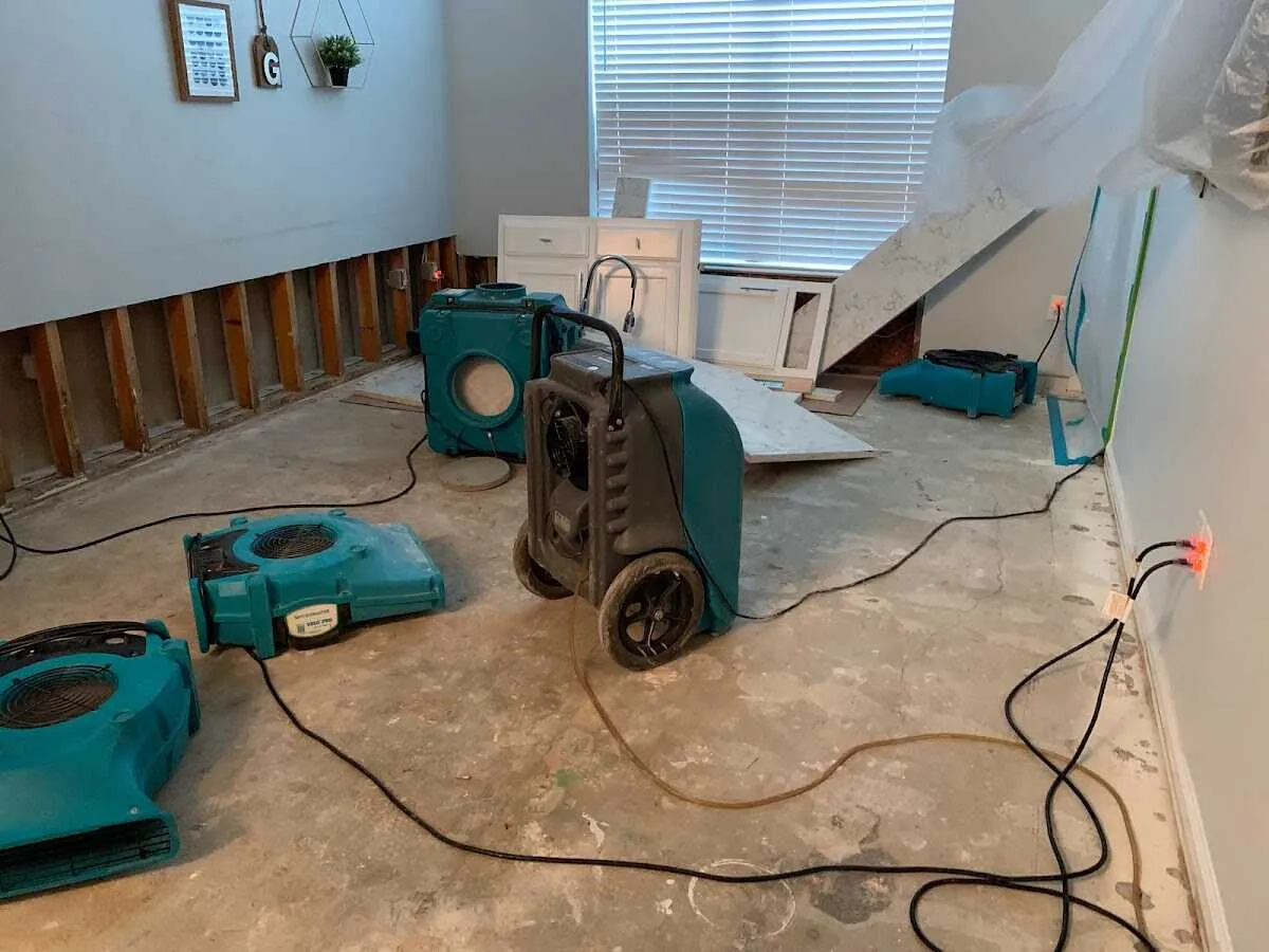 Dehumidifier in flood-cut room for Water Damage Restoration in Lavon